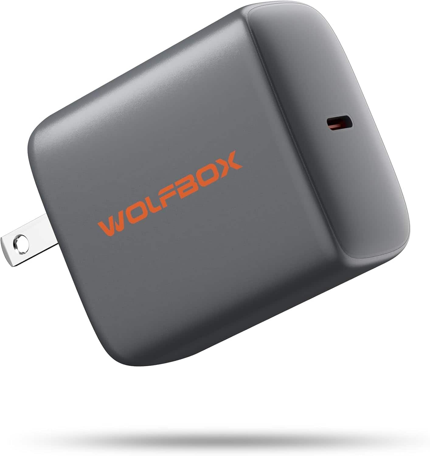 Wolfbox 65W PD Charger showing compact design and Type-C port